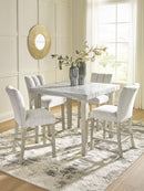 Larawyn - 5 Pc. - Counter Height Dining Table And 4 Barstools - Bisque